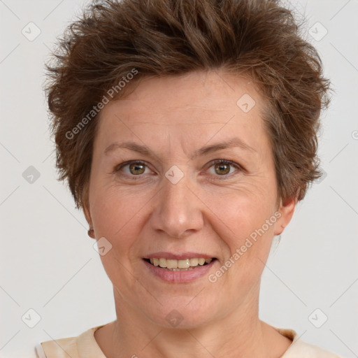 Joyful white adult female with short  brown hair and brown eyes