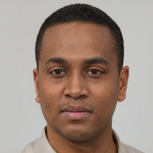 Neutral black young-adult male with short  black hair and brown eyes