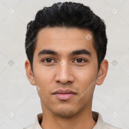 Neutral latino young-adult male with short  black hair and brown eyes