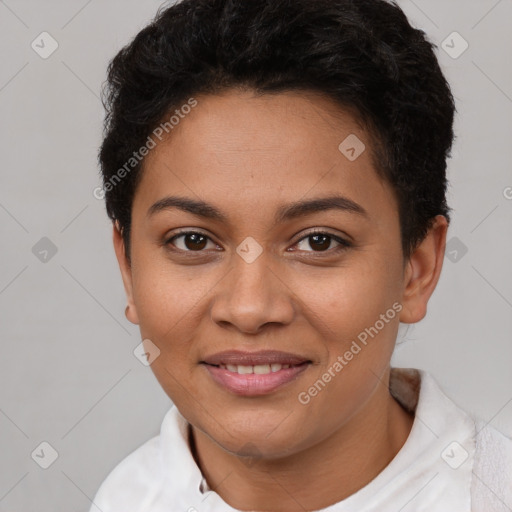 Joyful latino young-adult female with short  brown hair and brown eyes