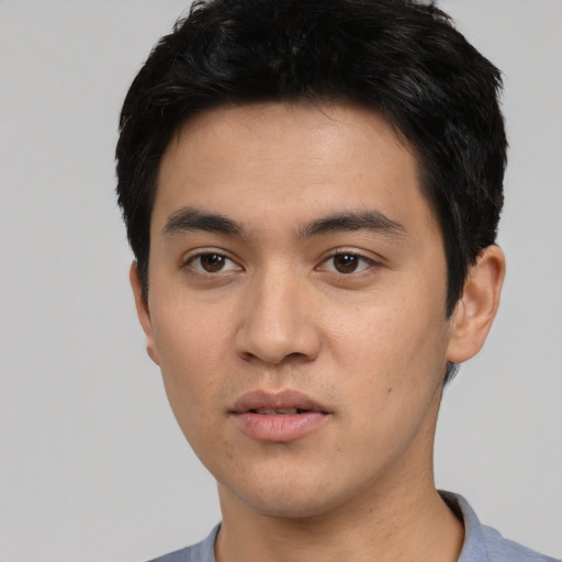 Neutral white young-adult male with short  black hair and brown eyes