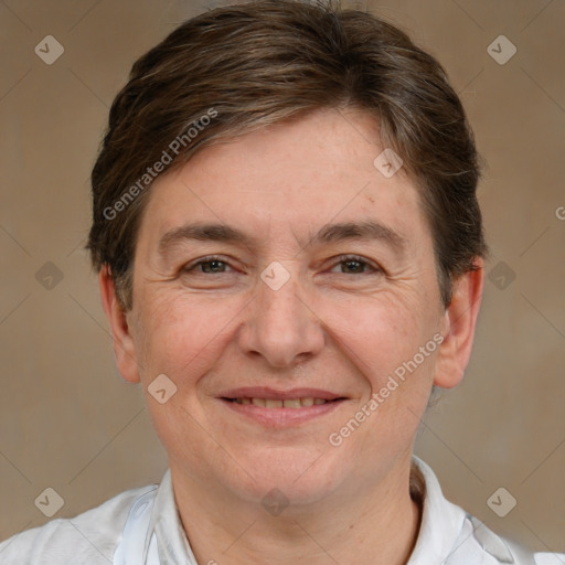 Joyful white adult female with short  brown hair and brown eyes