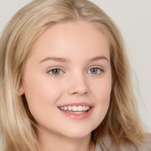 Joyful white child female with long  brown hair and brown eyes