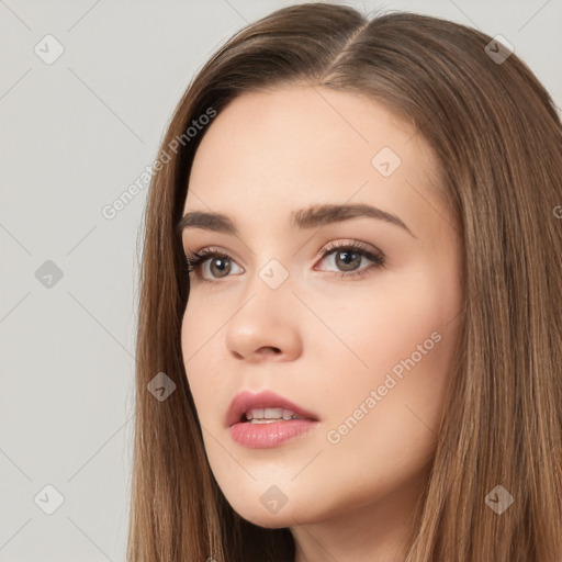 Neutral white young-adult female with long  brown hair and brown eyes