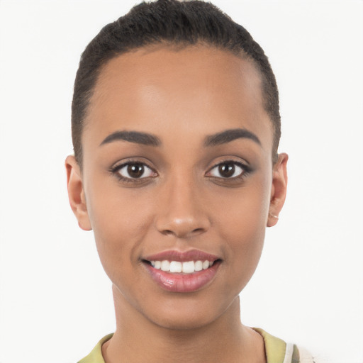 Joyful latino young-adult female with short  brown hair and brown eyes