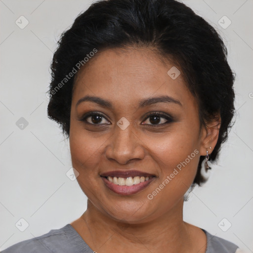 Joyful latino young-adult female with short  brown hair and brown eyes