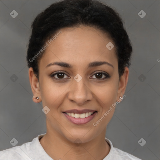 Joyful latino young-adult female with short  brown hair and brown eyes