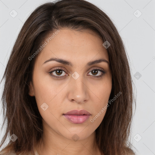 Neutral white young-adult female with long  brown hair and brown eyes