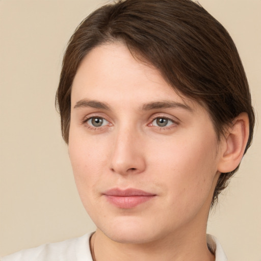 Neutral white young-adult female with short  brown hair and brown eyes