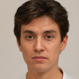 Neutral white adult male with short  brown hair and brown eyes