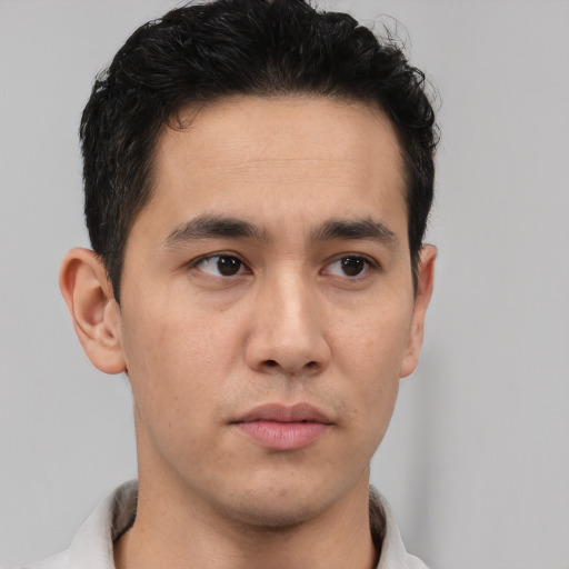 Neutral latino young-adult male with short  brown hair and brown eyes