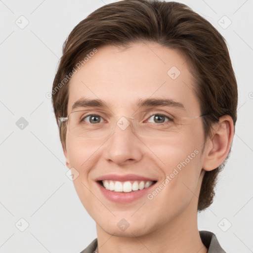 Joyful white young-adult female with short  brown hair and grey eyes