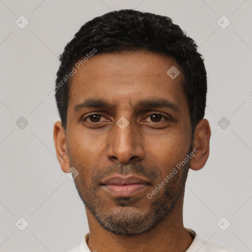 Neutral latino young-adult male with short  black hair and brown eyes