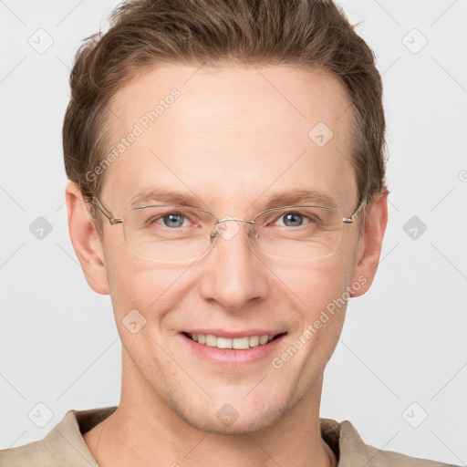 Joyful white adult male with short  brown hair and grey eyes