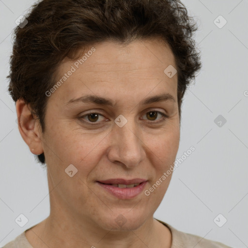 Joyful white adult female with short  brown hair and brown eyes