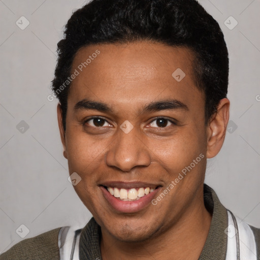 Joyful black young-adult male with short  black hair and brown eyes