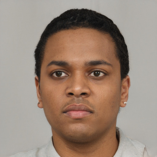 Neutral black young-adult male with short  black hair and brown eyes
