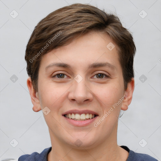 Joyful white young-adult female with short  brown hair and grey eyes