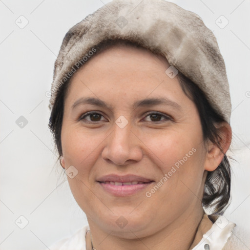 Joyful white adult female with short  brown hair and brown eyes