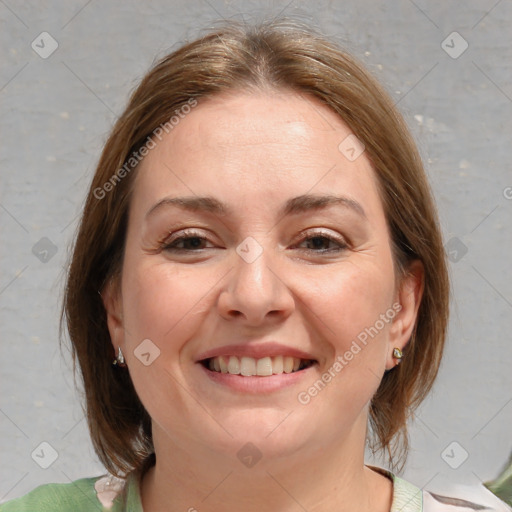 Joyful white young-adult female with medium  brown hair and blue eyes