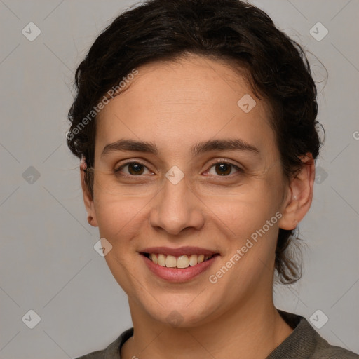 Joyful white young-adult female with medium  brown hair and grey eyes