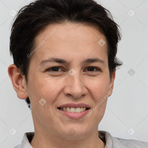 Joyful white adult female with short  brown hair and brown eyes