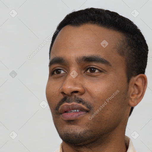 Neutral black young-adult male with short  black hair and brown eyes