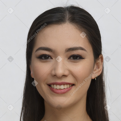 Joyful white young-adult female with long  brown hair and brown eyes