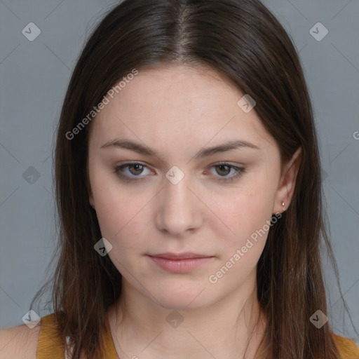 Neutral white young-adult female with long  brown hair and brown eyes