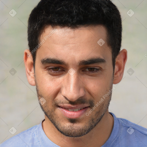 Joyful white young-adult male with short  black hair and brown eyes