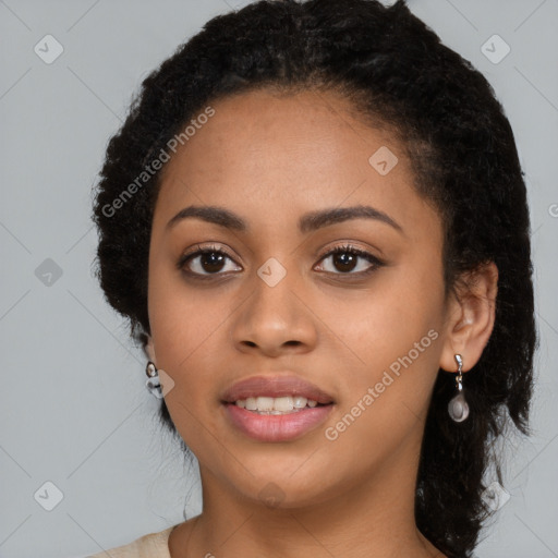 Joyful latino young-adult female with long  black hair and brown eyes