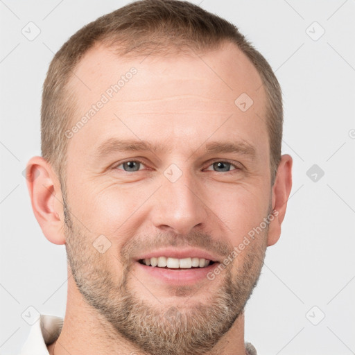 Joyful white adult male with short  brown hair and grey eyes