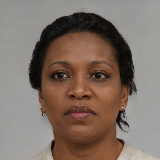 Neutral black young-adult female with short  brown hair and brown eyes