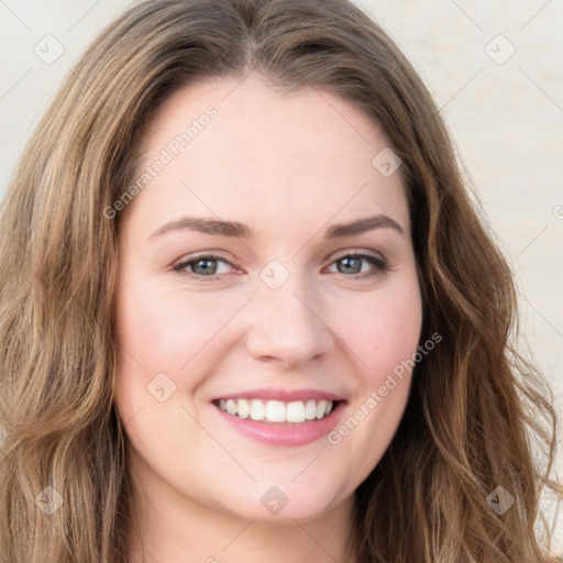 Joyful white young-adult female with long  brown hair and green eyes