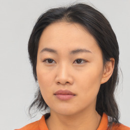 Neutral asian young-adult female with medium  black hair and brown eyes