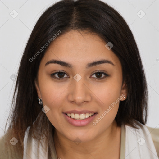 Joyful latino young-adult female with long  brown hair and brown eyes