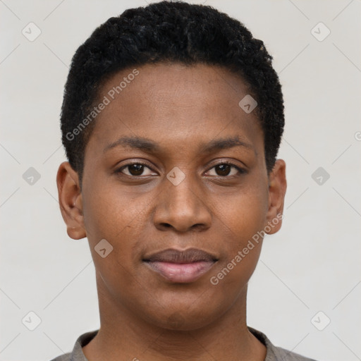 Joyful black young-adult female with short  black hair and brown eyes
