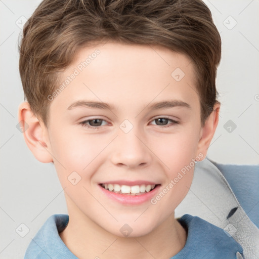 Joyful white child male with short  brown hair and brown eyes