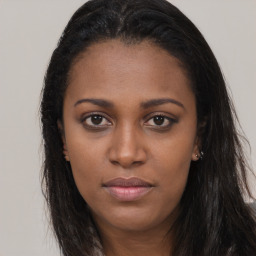 Neutral black young-adult female with long  brown hair and brown eyes