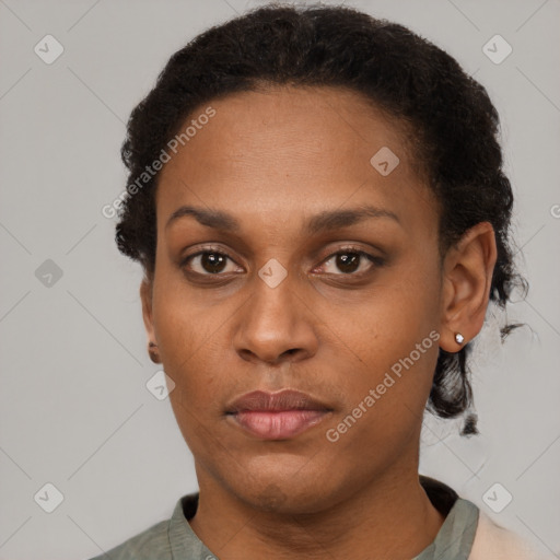 Neutral black young-adult female with short  brown hair and brown eyes