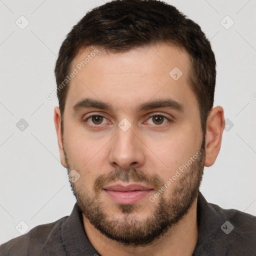 Neutral white young-adult male with short  brown hair and brown eyes