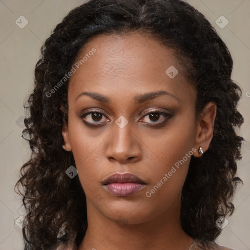 Neutral black young-adult female with long  brown hair and brown eyes