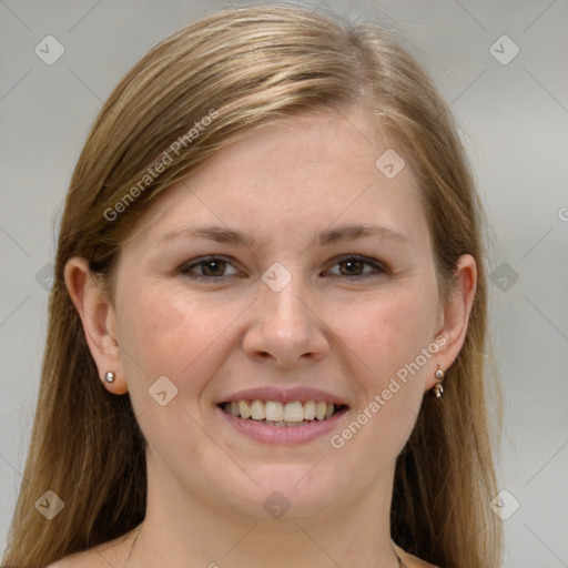 Joyful white young-adult female with medium  brown hair and grey eyes