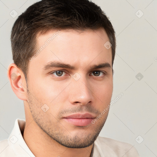 Neutral white young-adult male with short  brown hair and brown eyes