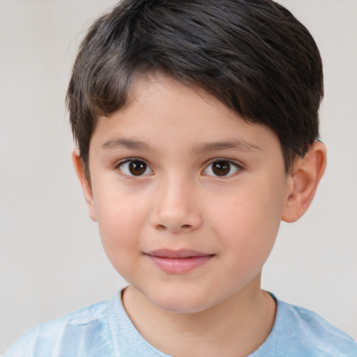 Joyful white child male with short  brown hair and brown eyes