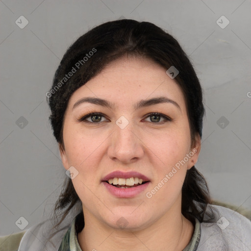 Joyful white young-adult female with short  black hair and brown eyes