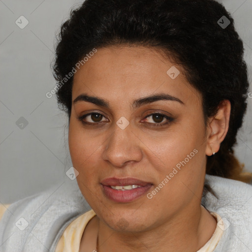 Joyful latino young-adult female with short  brown hair and brown eyes