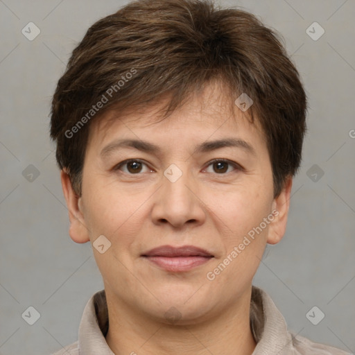 Joyful white adult female with short  brown hair and brown eyes