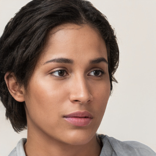 Neutral white young-adult female with short  brown hair and brown eyes