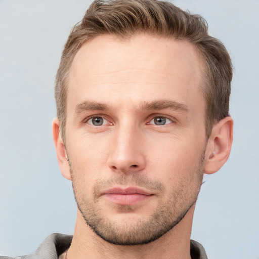 Neutral white young-adult male with short  brown hair and grey eyes